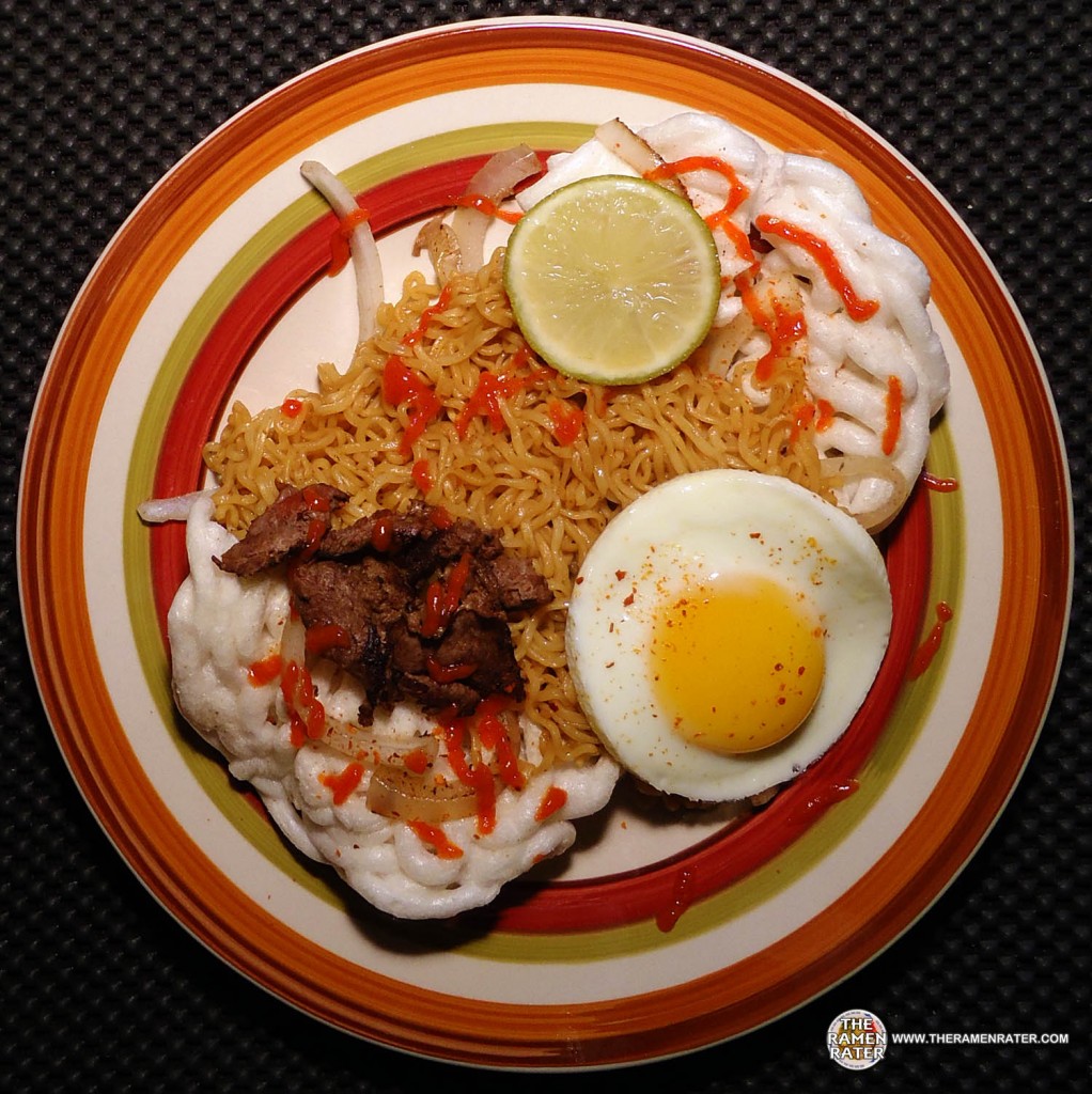 the large rectangular pieces are pangsit goreng (fried wontons).